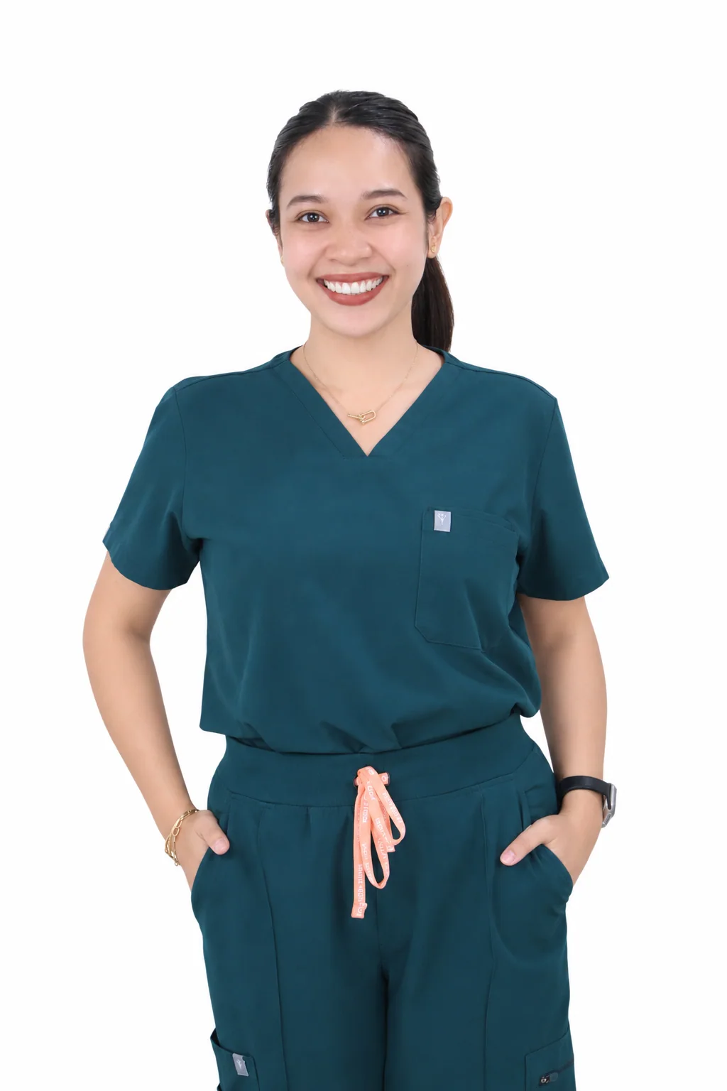Dr. Kristian Mae S. Soriano in teal clinical scrubs